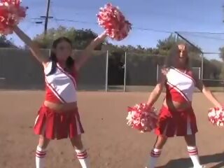 Cheerleader Girls immediately afterwards Football Game with Quarterback